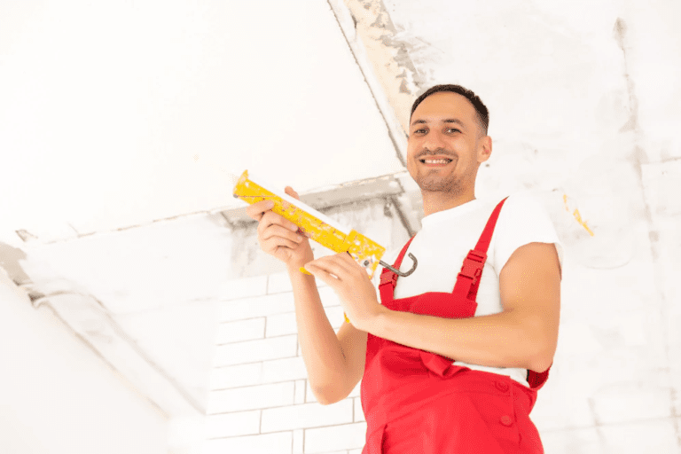 young man fixing ceiling insulated renovation construction 493343 23557 768x512